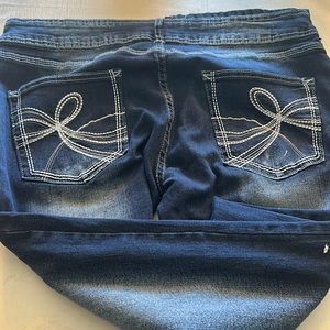 Nwot, slight flare stretch jeans, size XL.